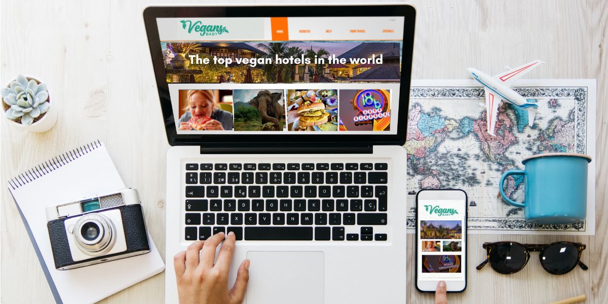 Vegan travel planning on a laptop and phone showing Vegans, Baby travel guides