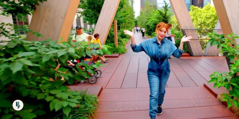 Vegan traveler walking through a city park while navigating travel decisions