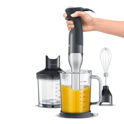 Breville immersion blender blending vegan soup in a measuring cup