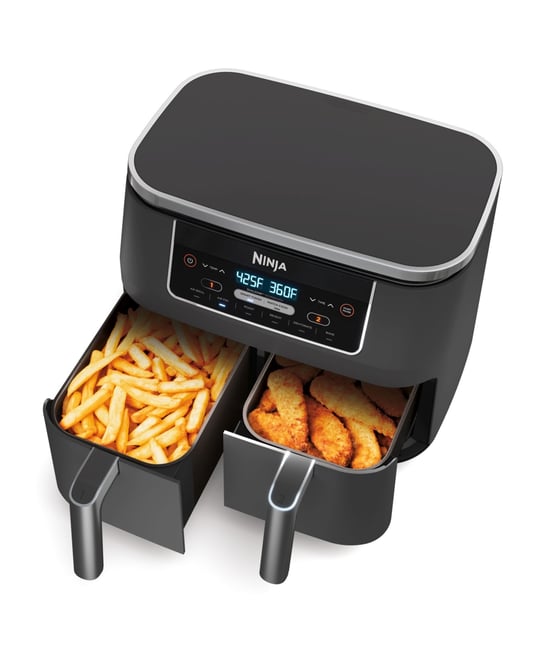 Ninja dual basket air fryer with fries and vegan nuggets in separate baskets