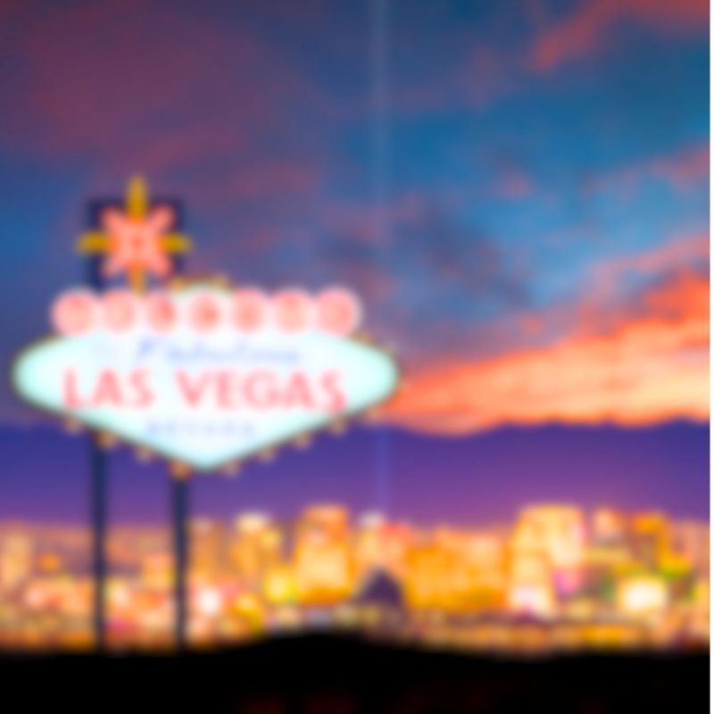 Featured graphic for “The Ultimate Vegan Guide to Las Vegas” with a blurred Las Vegas Strip background and retro-inspired typography.
