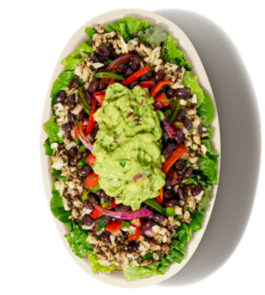 Vegan meal at Chipotle with salad bowl, burrito, chips, guacamole, and salsa